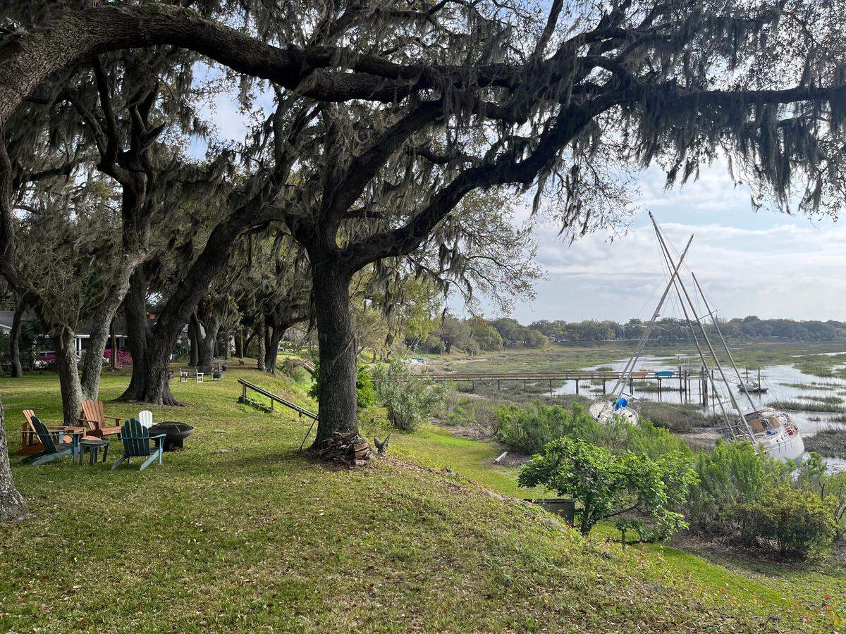 The views of the Beaufort River from homes along Bay Street have been obstructed since September by boats that were beached during Tropical Storm Helene. These two sail boats, shown Wednesday, are located behind Bay Street homes near Glebe Street.