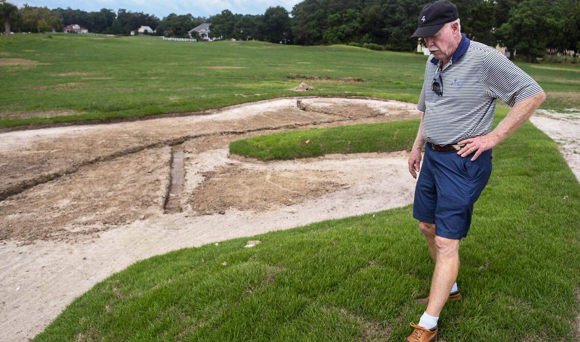 Golf course architect John LaFoy pushes on newly laid sod with his foot near the ninth green on Thursday, Sept. 1, 2022, its bunker ready for drainage to be installed before bringing in new sand at Cat Island Golf Club on Cat Island. LaFoy was hired by Resort Development Partners — the new owners of the now private club — to renovate the course including rebuilding the greens and bunkers.