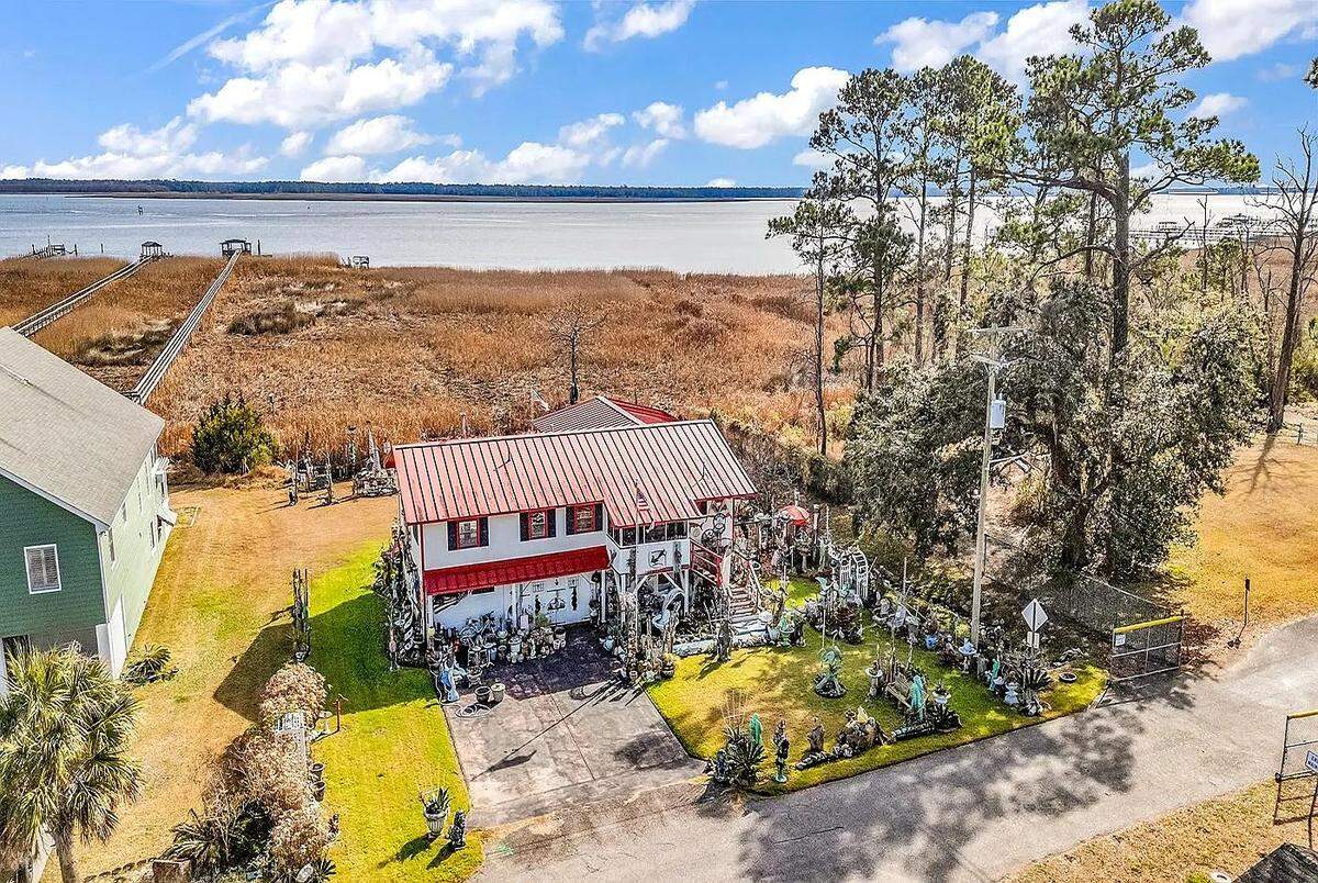 The collection of Larry Marsh’s items extends outside his home, which is now for sale at 2023 Ashbury Street in Georgetown.