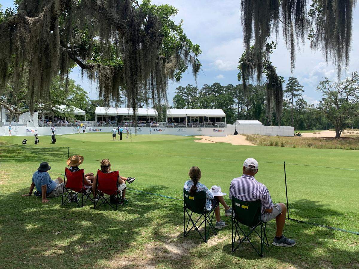 Jim and Julie Drew, of Dataw Island, find a shady spot to watch players put into the hole on Thursday, June 10, 2021, at the PGA Tour’s Palmetto Championship at Congaree in Jasper County.