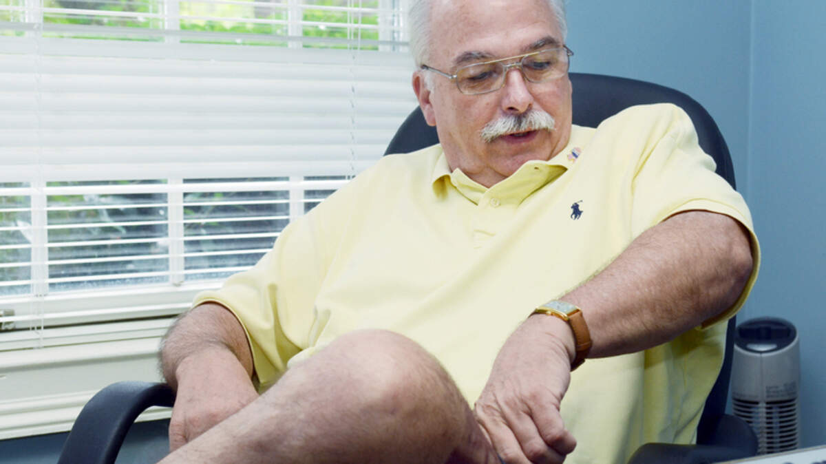 Hilton Head Islander Barry Ginn shows how far he can lift his left arm after he fell victim to a rare bacterial infection that attacks soft tissue and destroys muscle. Necrotizing fasciitis often leads to amputation and in some cases death. Ginn had severe pain and a fever in his shoulder in February. He went to his doctor thinking he had torn his rotator cuff. Eventually, he learned that bacteria was eating him alive. To save him, three doctors removed much of his upper shoulder and arm as he underwent nine surgeries in just four days. 