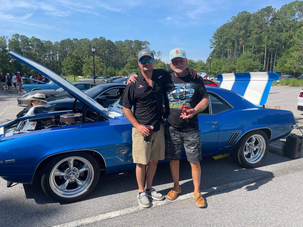 Brandon and Doug Jordan at the ‘Cars and Coffee’ car meet in Bluffton on Father’s Day weekend. The duo were in town to show their 1969 blue and white Z-28 Camaro.