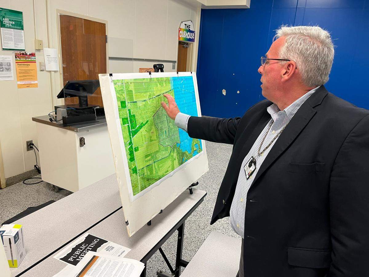 Beaufort County Administrator Eric Greenway explains a plan the county is considering to buy the former Lobeco chemical plant during a meeting at the James J. Davis Early Childhood Center Tuesday. Greenway says the land is suitable for development as a commerce park but the county won’t proceed without “buy-in” from residents and additional environmental study.