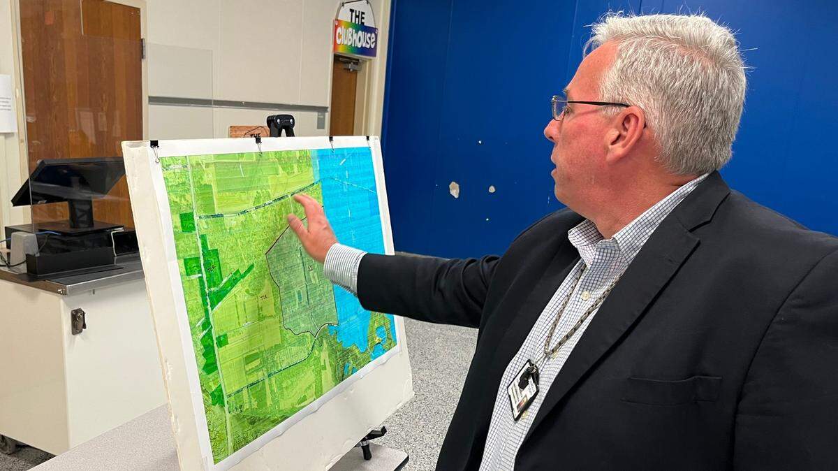 Beaufort County Administrator Eric Greenway explains a plan the county is considering to buy the former Lobeco chemical plant property during a meeting at the James J. Davis Early Childhood Center Tuesday. Greenway says the land is suitable for development as a commerce park but the county won’t proceed without “buy-in” from residents and additional environmental study.