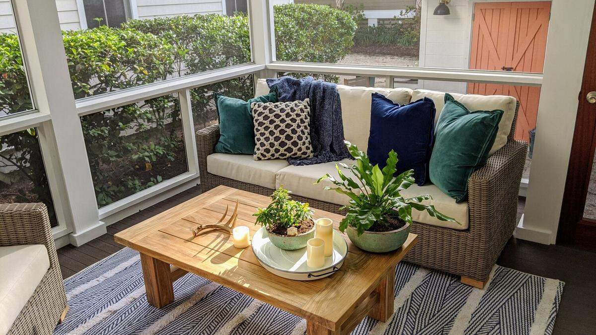 An screened in porch area in the Southern Living Showcase Home.