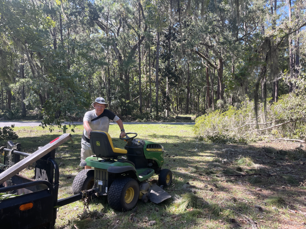 Dr. John Thompson, a Melrose resident, worked in his yard Monday afternoon four days after a tornado touched down near his home early Thursday morning.