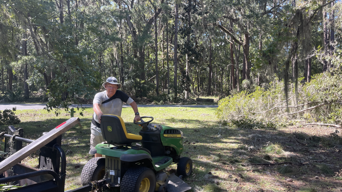 Dr. John Thompson, a Melrose resident, worked in his yard Monday afternoon four days after a tornado touched down near his home early Thursday morning.