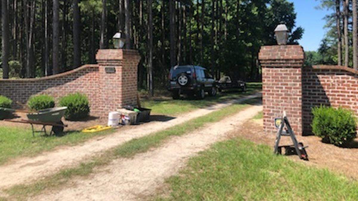 A worker was installing a metal gate at the entrance of the Murdaugh family home in Islandton, SC. He said it was for privacy because people had been trying to get on the property.