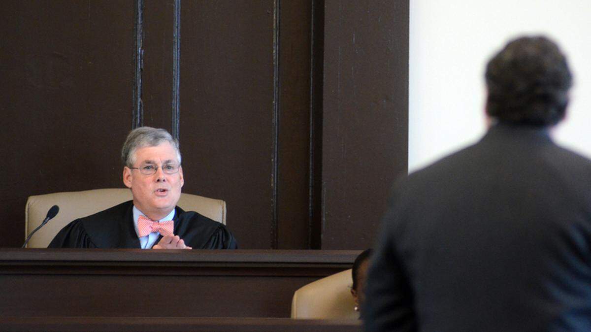 Circuit Court Judge Markley Dennis Jr. responds to  one of the lawyers representing Bluffton tow-truck driver Preston Oates  Tuesday morning during a hearing at the Jasper County Courthouse in  Ridgeland.