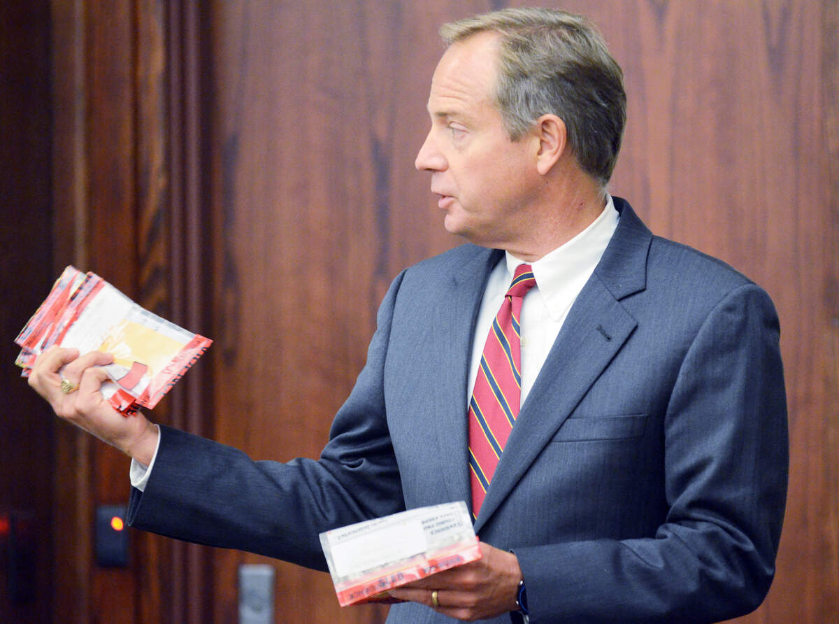 14th Circuit Solicitor Duffie Stone holds evidence bags containing 9 mm cartridge cases and bullets collected as evidence after the shooting of 8-year-old Khalil Singleton during the murder trial for Aaron Young Sr. in 2015 at the Beaufort County Courthouse. Young Sr. is accused of being one of three men involved in a shoot-out on Hilton Head Island that led to the death of Singleton in 2012.