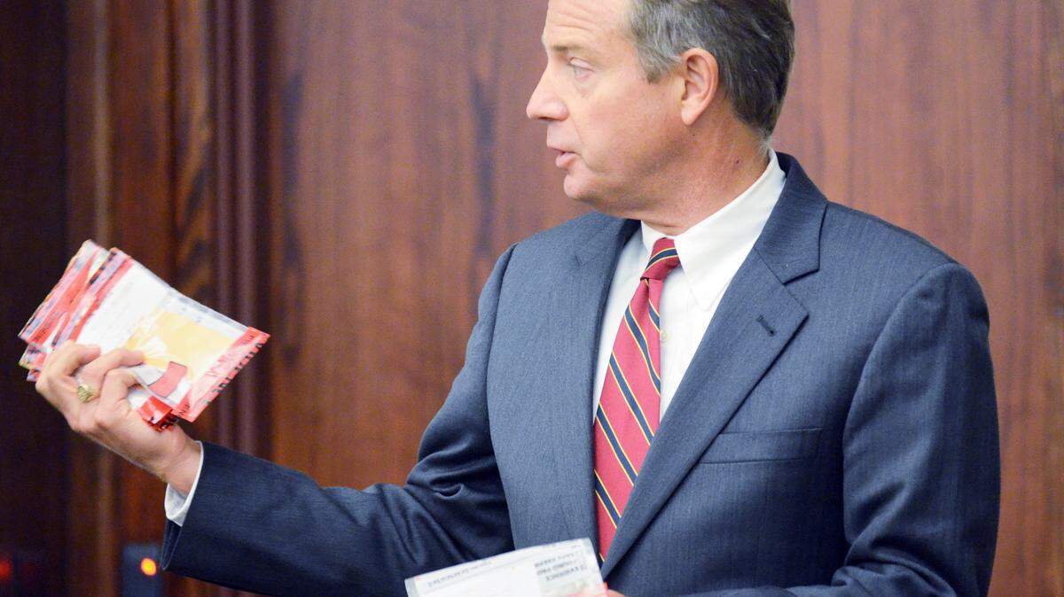 14th Circuit Solicitor Duffie Stone holds evidence bags containing 9 mm cartridge cases and bullets collected as evidence after the shooting of 8-year-old Khalil Singleton during the murder trial for Aaron Young Sr. in 2015 at the Beaufort County Courthouse. Young Sr. is accused of being one of three men involved in a shoot-out on Hilton Head Island that led to the death of Singleton in 2012.