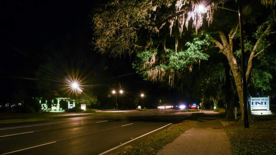 Photographed with a long exposure, the only overhead street lights on U.S. 278 illuminate the pedestrian crosswalk at Yacht Cove Drive on May 1, 2023 on Hilton Head Island. The lights were installed in October 2020 as a pilot project for street lighting after 11-year-old islander Charli Bobinchuck died while crossing U.S. 278 with her dog, Max, in June 2018.