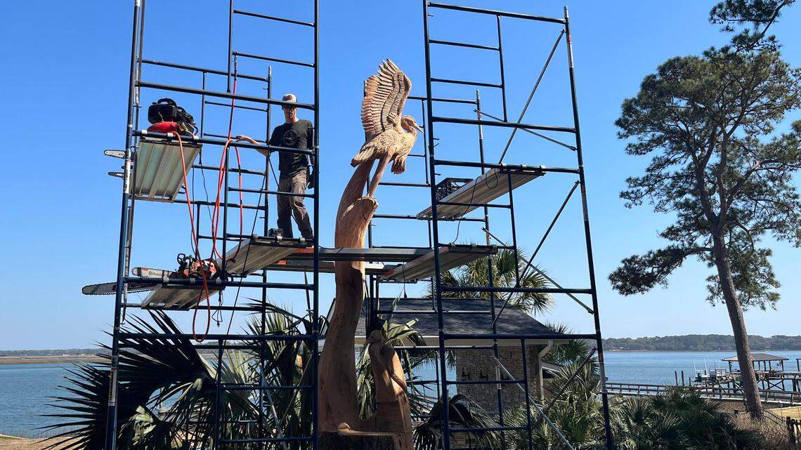 Massive oak tree felled along Beaufort River. See how an artist is giving it new life