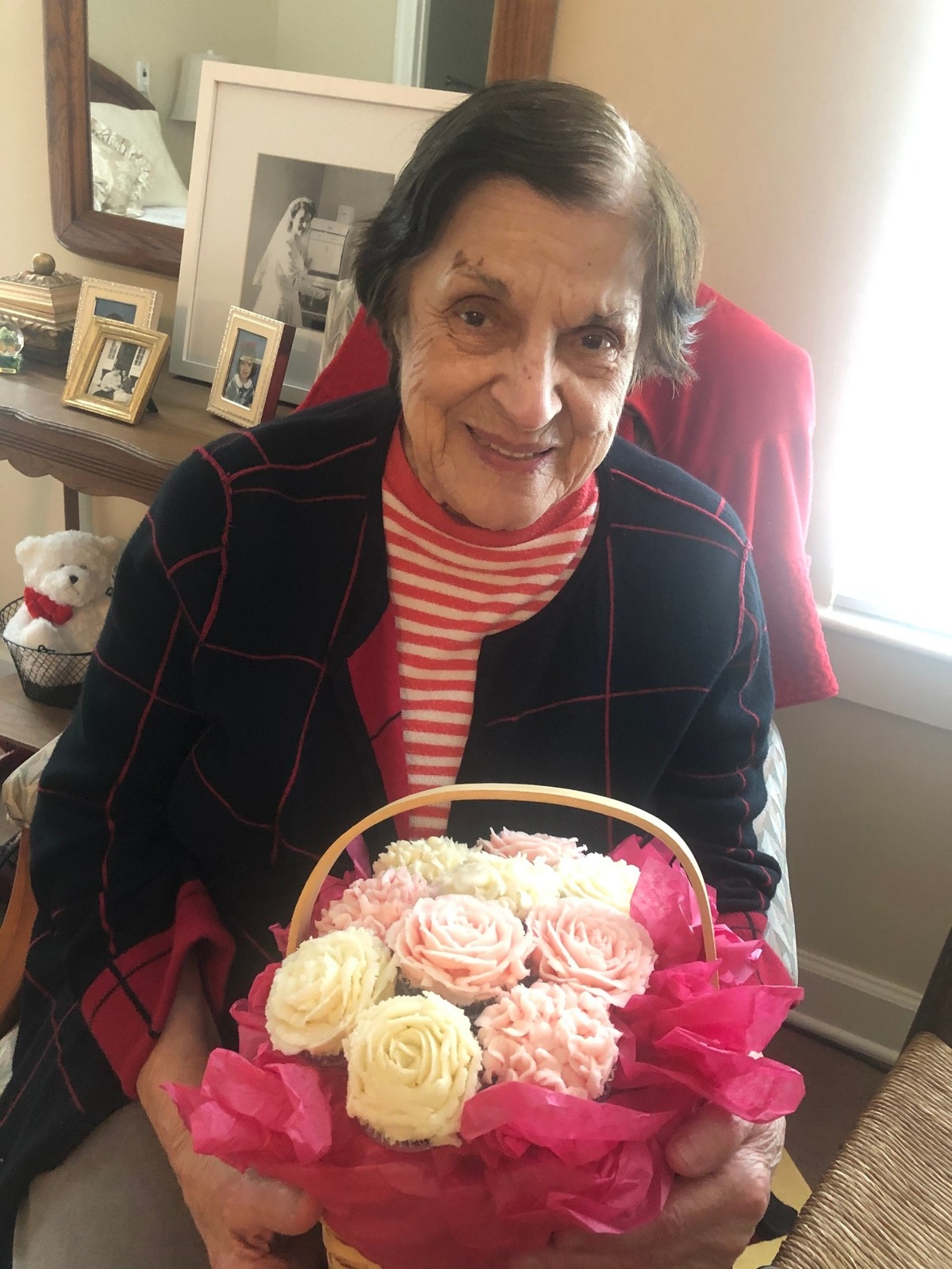 Olympia Bafundo with a cupcake bouquet made by one of her nurses at Hospice Care of the Lowcountry. She recovered from COVID-19 at 98 years old.