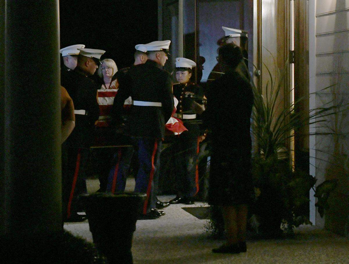 The casket containing the body of Marine Corps Lt. Col. Andrew Mettler was carried into Sauls Funeral Home in Bluffton on Tuesday night. His body was escorted by air to Atlanta and, once the procession crossed the Georgia-South Carolina border, it was met by the Patriot Guard Riders from Bluffton for the remainder of the trip.