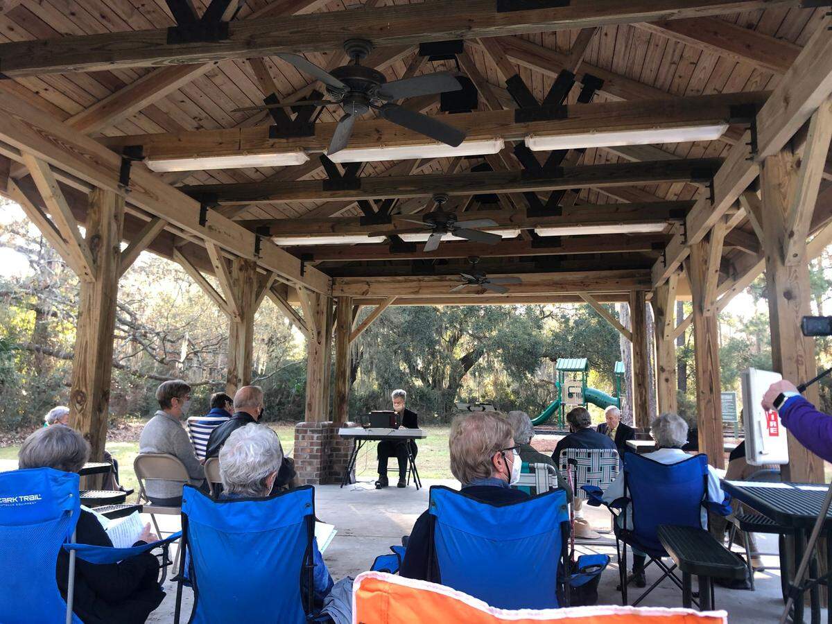 The congregation at Chapel Without Walls has been meeting in Jarvis Creek Park since May.
