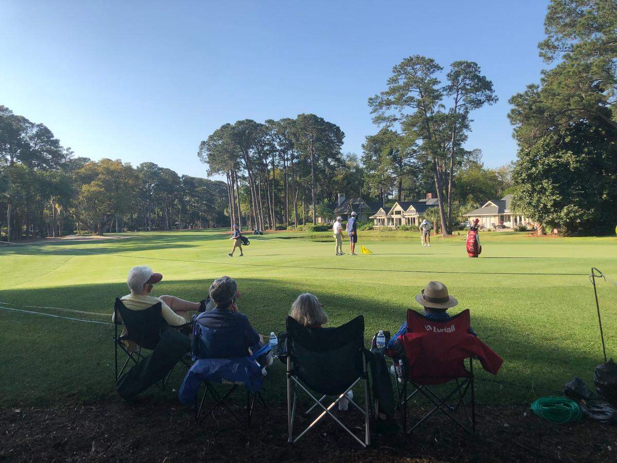 Fans watch Bluffton native Bryson Nimmer play the 8th hole during Wednesday’s pro-am at RBC Heritage Presented by Boeing.