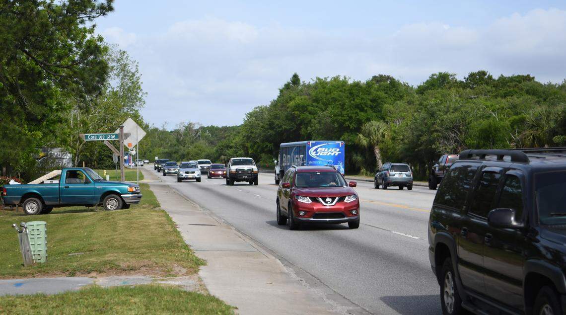 A driver waits for several minutes on Cora Lee Lane Thursday morning before he has a chance to merge onto U.S. 278 as rush hour traffic heads onto Hilton Head Island.