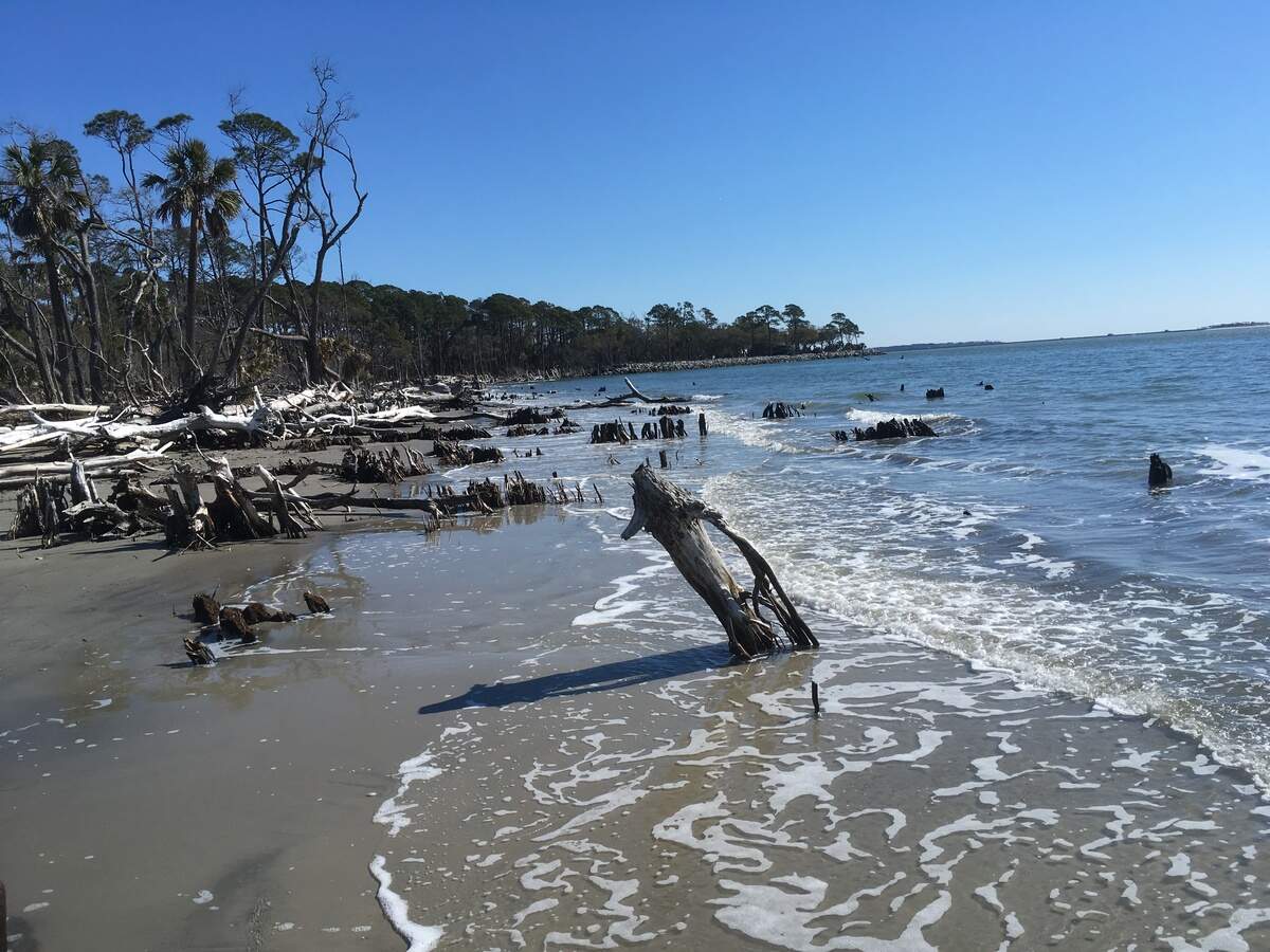 St. Phillips Island includes a mile of beach. The main house sits on the point in the distance.