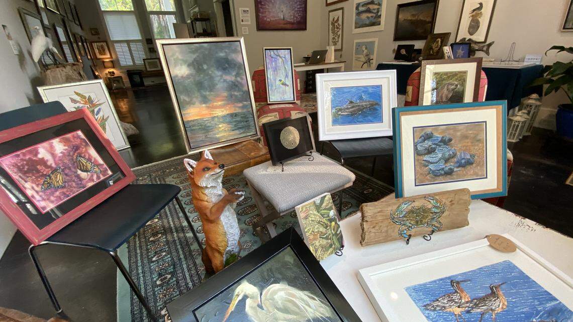 Robert Howell of the Mystic Osprey Gallery arranged a variety of pieces so they could be viewed at COVID-19 safety by passers-by looking through the large bay window at his Habersham gallery.