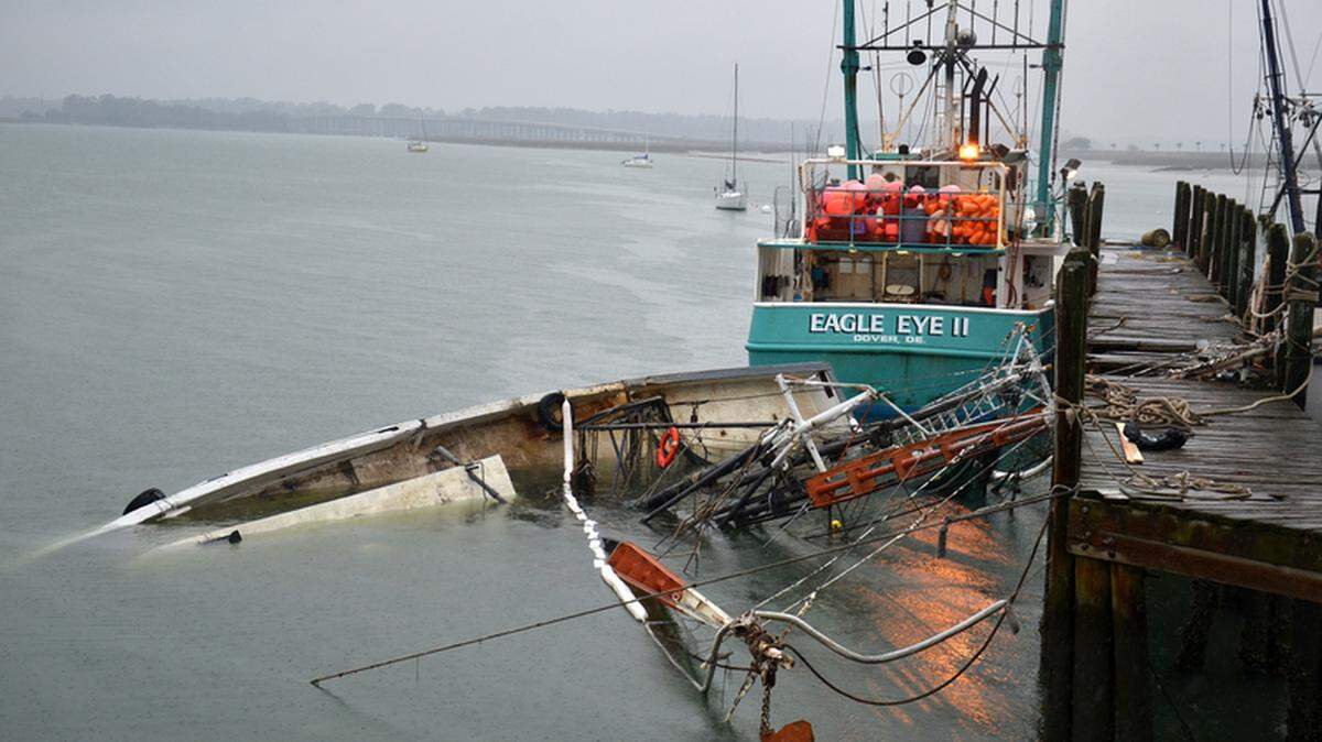 A shrimp boat is seen in this February 2013 file photo after it sank, its mast breaking a section of dock at the Port Royal  shrimp dock where it had been moored. 