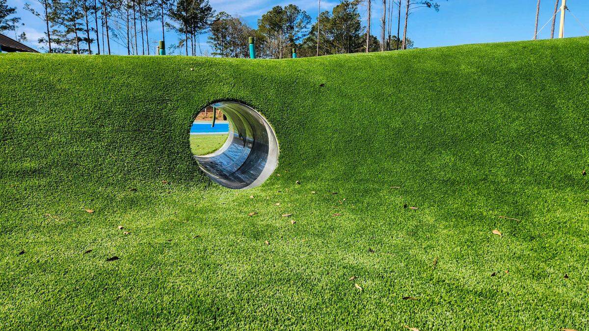 A crawl-through tube in an embankment as photographed on Jan. 28, 2025, is featured in one section at the New Riverside Barn Park set for a grand opening on Feb. 22 in Bluffton.