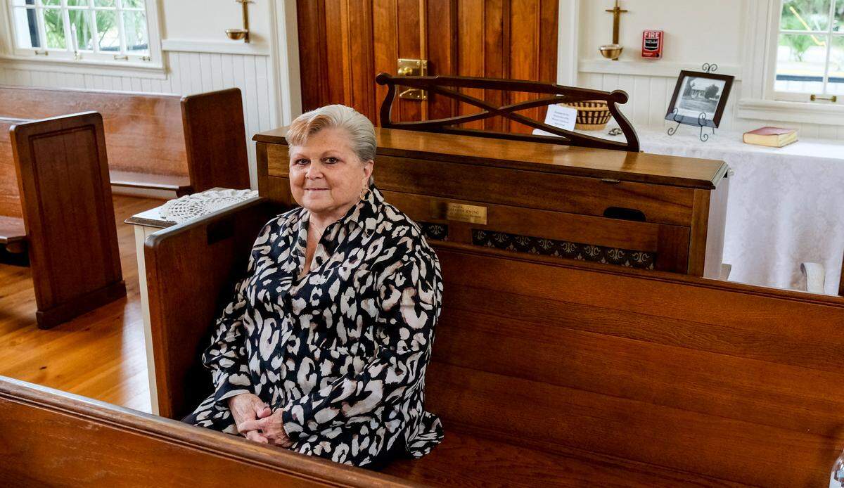 Theresa Pulliam, a longtime caretaker of the church, sits for a portrait on Friday, Nov. 5, 2021 at St. Peter the Apostle Catholic Church on Carteret Street in Beaufort. The church, the oldest Catholic church in Beaufort County in Beaufort is celebrating its 175th anniversary and according to a historical marker.