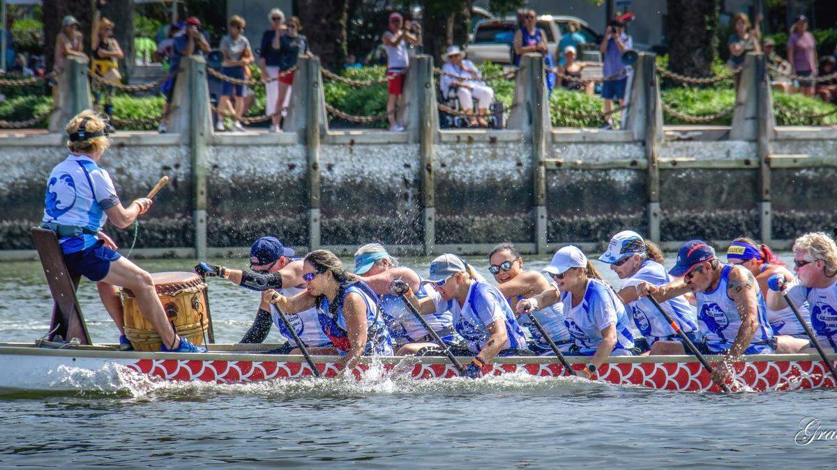 A drum is used to set the paddling pace during Beaufort’s dragon boat race Saturday.