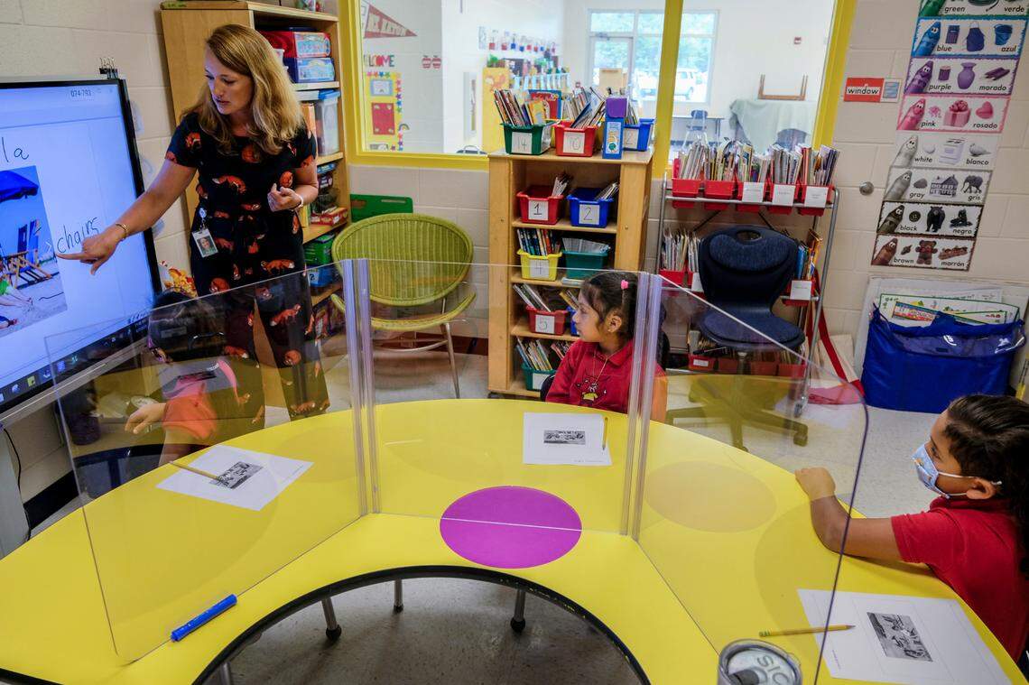 Erin Berglind teaches children learning English in her ESOL class at Red Cedar in 2021, during the pandemic.