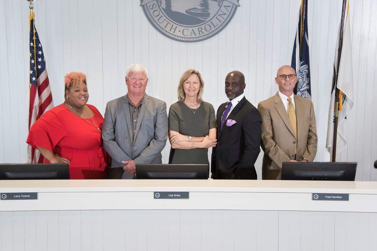A photograph of Bluffton Town Council members Bridgette Frazier, Larry Toomer, Lisa Sulka, Fred Hamilton and Dan Wood.