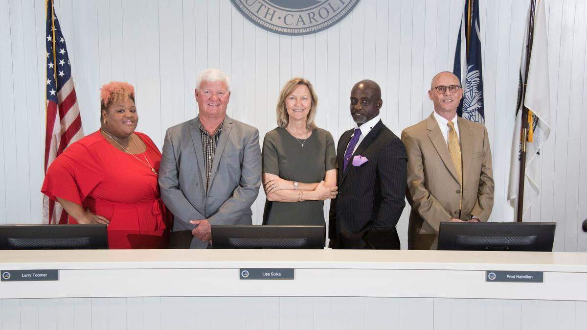 A photograph of Bluffton Town Council members Bridgette Frazier, Larry Toomer, Lisa Sulka, Fred Hamilton and Dan Wood.
