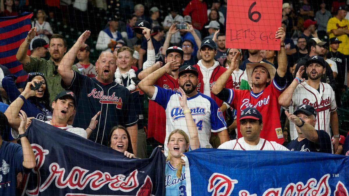 Atlanta Braves fans celebrate after winning baseball’s World Series in Game 6 against the Houston Astros Tuesday, Nov. 2, 2021, in Houston. The Braves won 7-0. (AP Photo/Eric Gay)