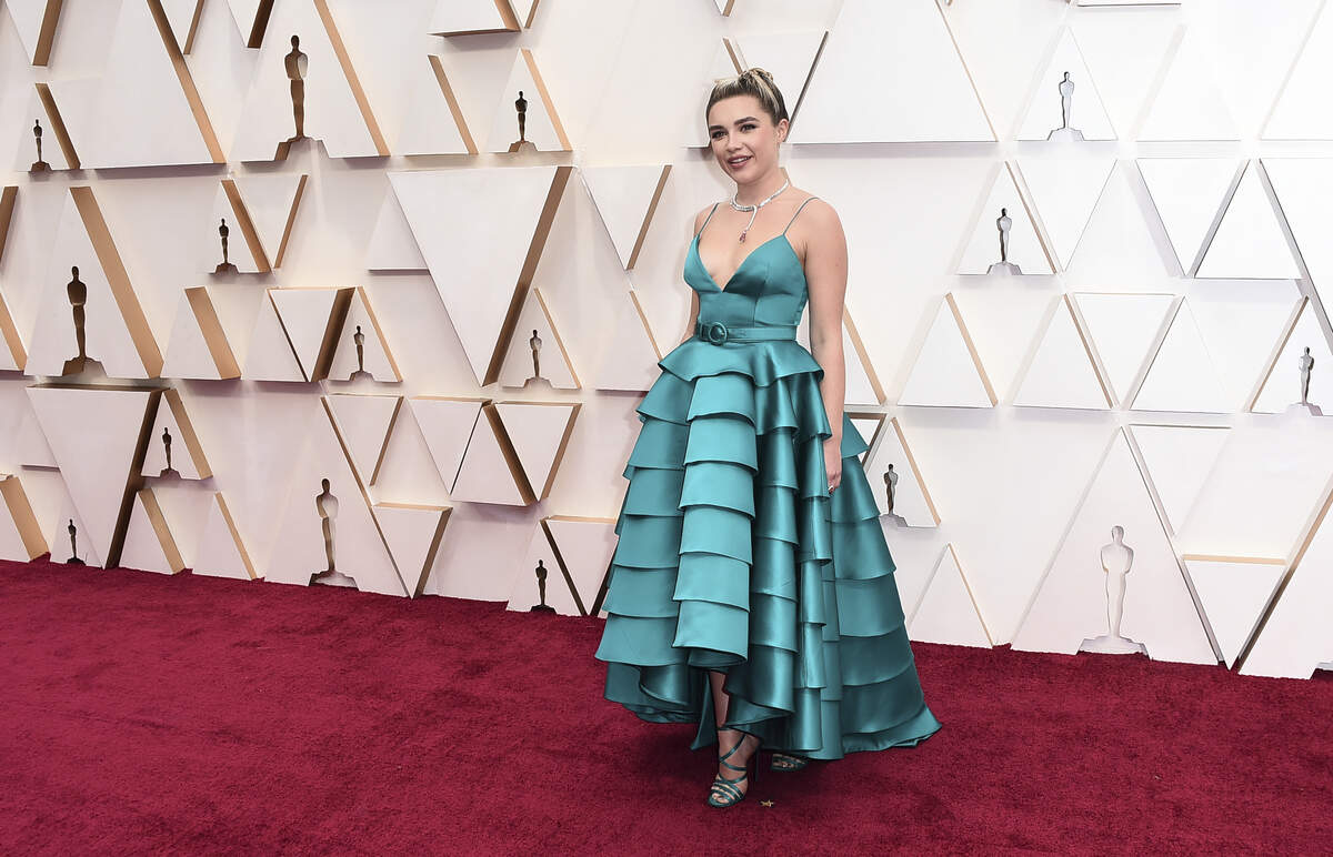 Florence Pugh arrives at the Oscars on Sunday, Feb. 9, 2020, at the Dolby Theatre in Los Angeles. 