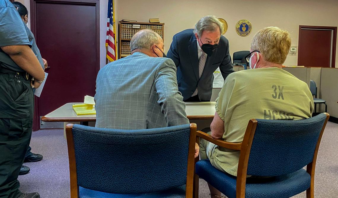 Attorneys Jim Griffin, left, and S.C. Senator Dick Harpootlian, center, speak with their client Richard Alexander Murdaugh on Thursday, Sept. 16, 2021 at his bond hearing at the Hampton County Law Enforcement Center in Hampton, S.C.