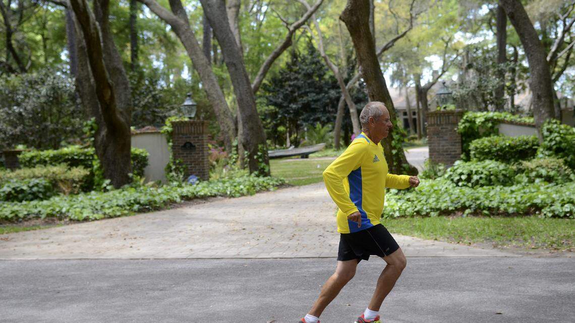 Louie Cap trains for the 2014 Boston Marathon by running through his neighborhood on April 13 on Hilton Head Island.  Cap will be running the Boston Marathon this year for the 39th time.  He participated in the 2013 Boston Marathon and was just blocks away from the finish line when the first bomb went off.