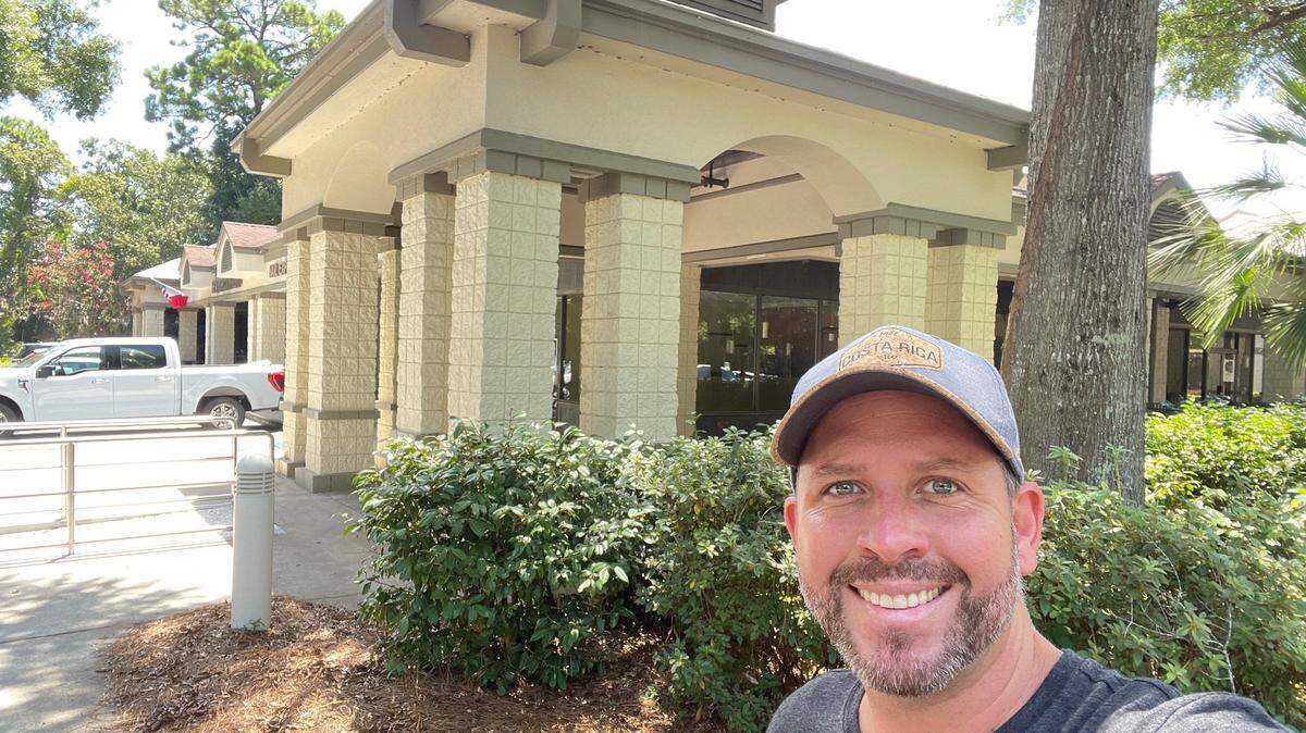 Corner Perk owner Josh Cooke takes a selfie outside the new future Corner Perk location at 45 Pembroke Drive. Photo courtesy of Josh Cooke.