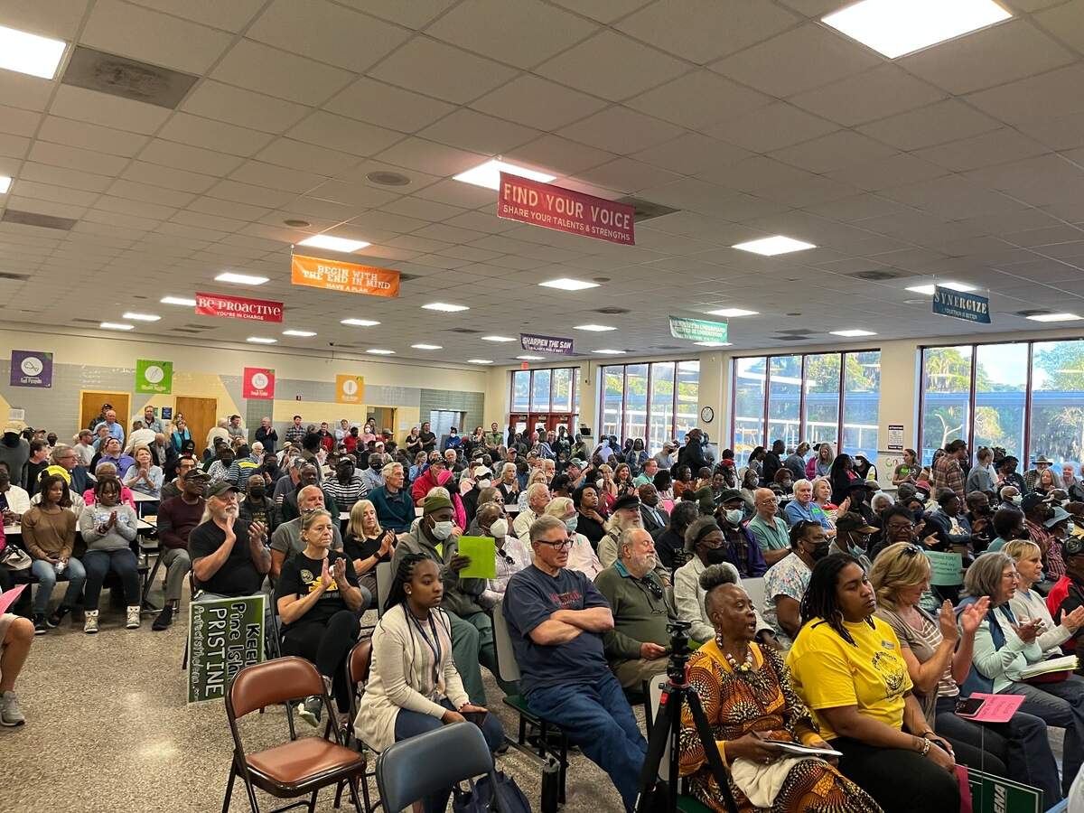 A meeting on a proposed golf and housing development drew more than 450 people to St. Helena Elementary School Thursday.