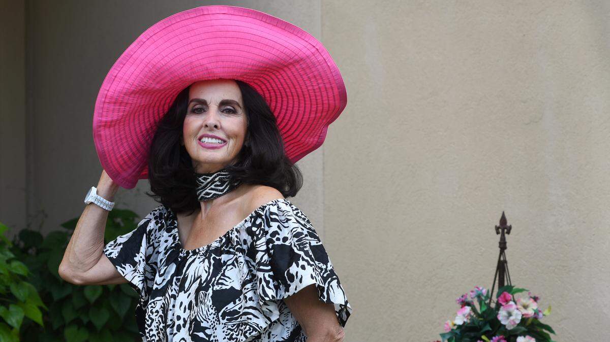 Joanna Baeren is photographed on Monday wearing of the many hats in her hat collection.
