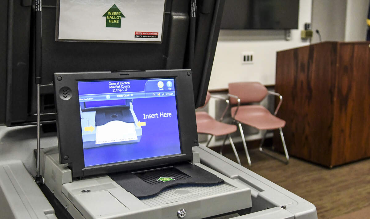 Beaufort County voters had their first experience with the state’s new election machines in 2019 at the Hilton Head Island Library Branch. Voters insert a blank paper ballot into the machines, cast their votes which then prints their choices. Voters then feed their paper ballots into a tabulator as seen in this photo. The poll manager said voting was light but steady, allowing poll clerks time to walk voters through the new voting process.