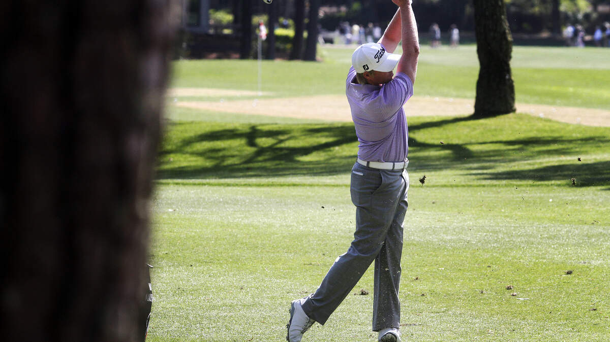 Mark Anderson, of Beaufort, S.C., drives the ball towards the green on ninth hole during the first round of the 2014 RBC Heritage Presented by Boeing at Harbour Town Golf Links in Sea Pines on Hilton Head Island S.C.
