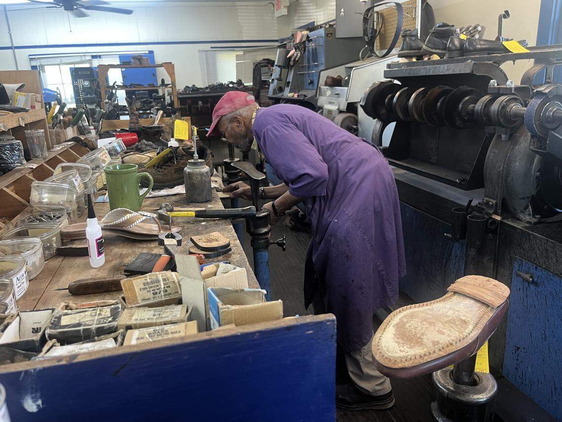 Stephen Mobley replaces the sole of shoe. He’s been fixing shoes in Beaufort since the 1960s.