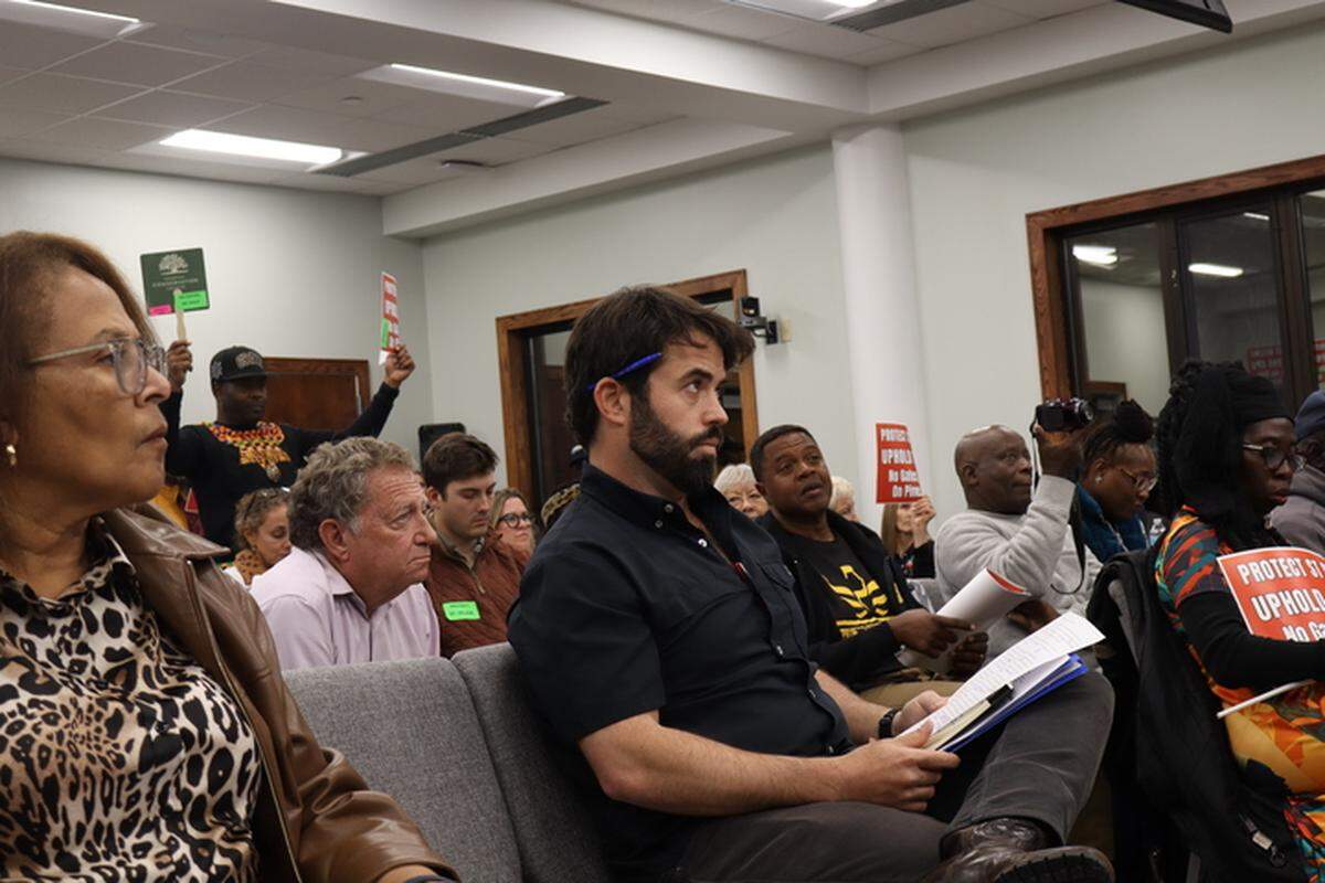 Elvio Tropeano, who has served as the public face representing the owners of Pine Island, takes notes during a Beaufort County Council meeting held on Dec. 8, 2025.