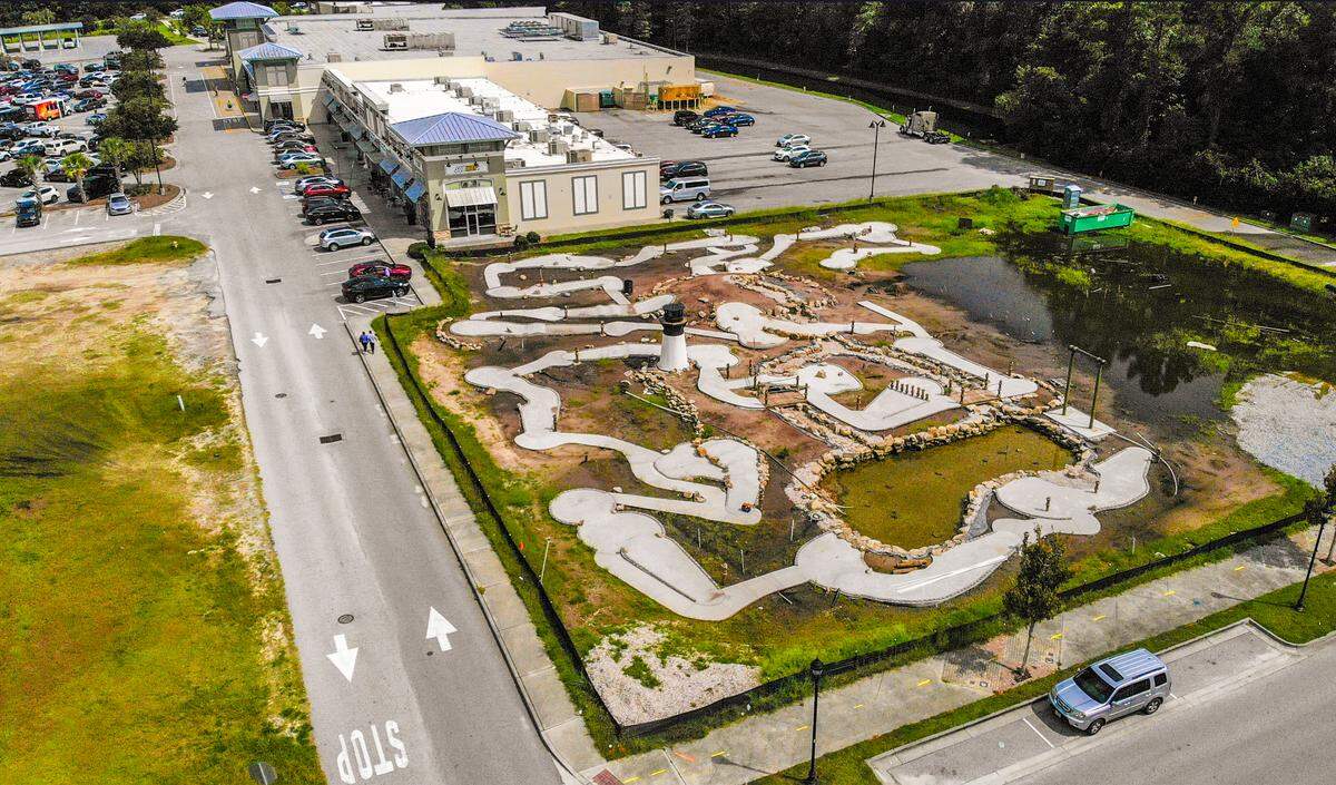 Bluffton’s first mini-golf, it’s centerpiece a lighthouse painted to resemble Hunting Island’s lighthouse, is nearing completion as seen on Wednesday, Aug. 31, 2022 at Buckwalter Place. Lighthouse Lagoon Mini Golf, expected to open before the end of the year, will also have a 1,300-square foot building for concessions and a 40-seat pavilion.