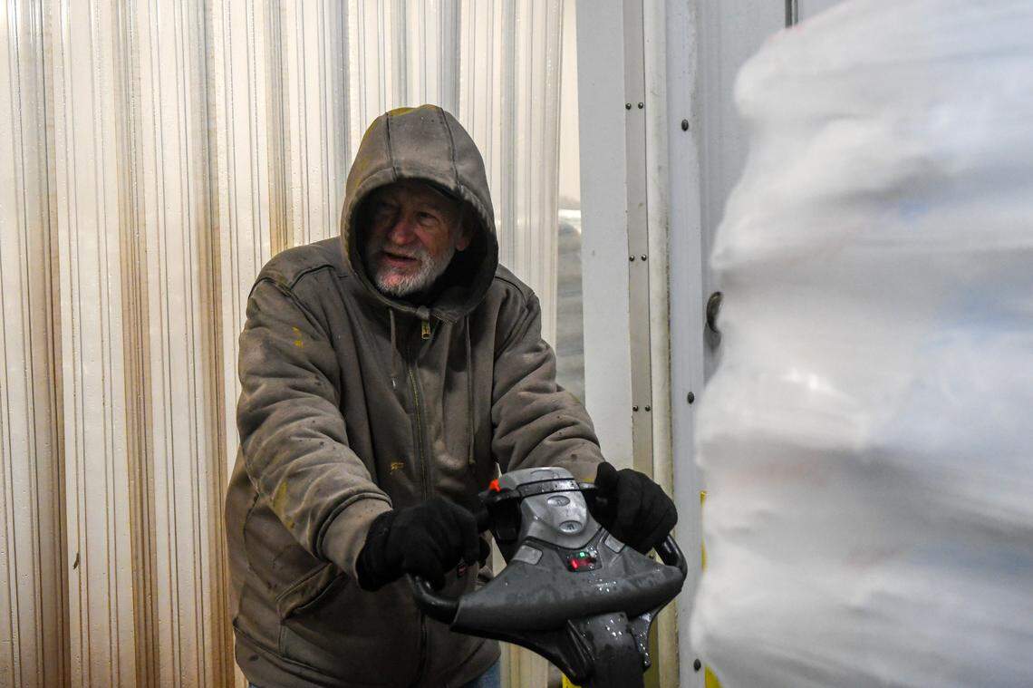 Karl Nettles, delivering ice to a storage facility off Guess Drive, speaks about the “great monkey escape” while pushing pallets full of ice into a freezer on Nov. 7, 2024 in the Town of Yemassee. Nettles, who is accustomed to the occasional escape of the biomedical primates, believes the monkeys will make their way back to the facility or face their demise from blacks bears or alligators.