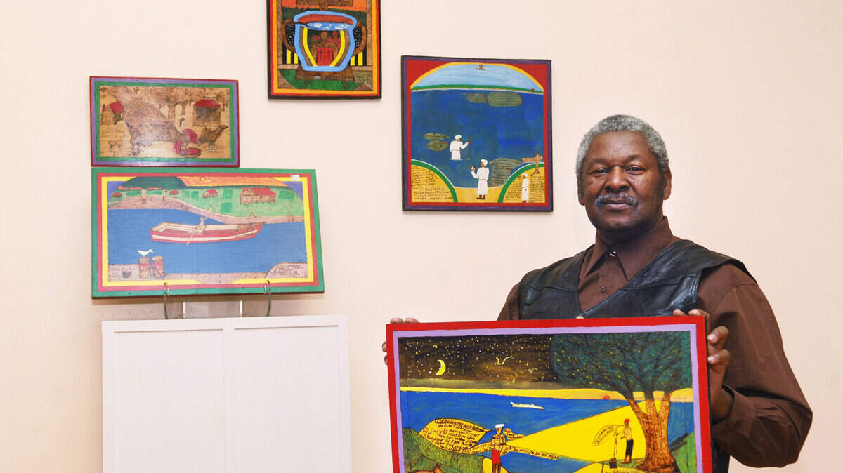 Johnnie Simmons, of Yemassee, photographed Feb. 4, 2015, with a few of the pieces from his upcoming art show at ARTworks gallery in Beaufort.