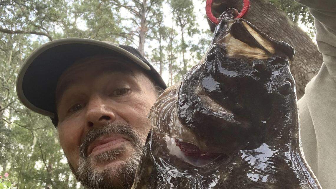 Rainy days and tall tales: The Flounder King slips away, and the ’2 oz.’ face imprint