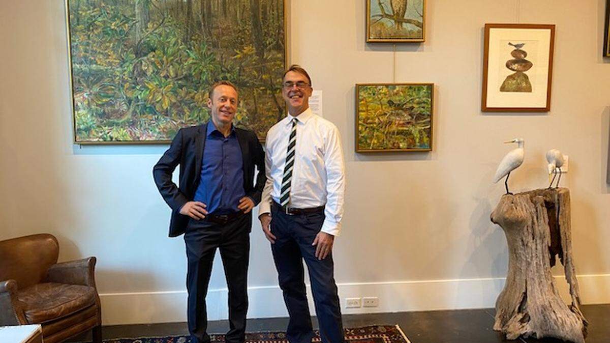 Artist Michael Ross, left, and gallery owner/director Robert Howell at the Mystic Osprey Gallery.
