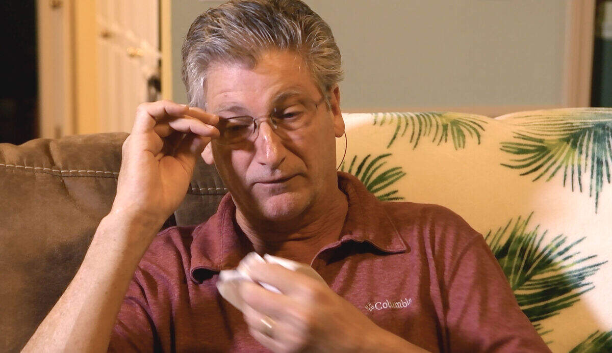 Carl Rutland, a resident of Lady’s Island, wipes away a tear while being interviewed about his childhood years and his friendship with David Krulewicz.