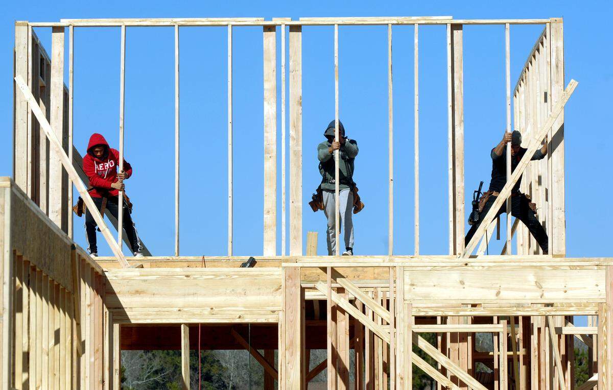 A wall goes up on another house under construction in Bluffton’s Hampton Lake on Friday. The Bluffton development appears poised for another good year for homebuilding, having recently submitted plans to the town for a 135-lot expansion.