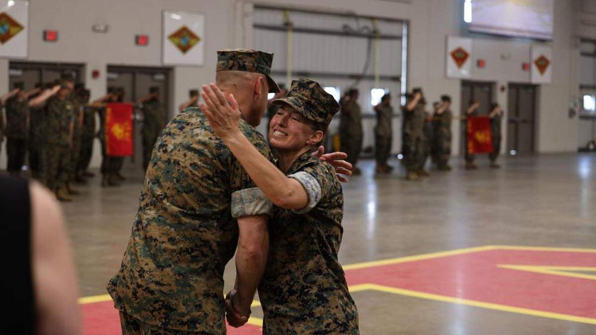 Brig. Gen. Julie L. Nethercot relinquishes command of Marine Corps Recruit Depot Parris Island, S.C. and the Eastern Recruiting Region, to Brig. Gen. Walker M. Field during a change of command ceremony at Parris Island, Friday.